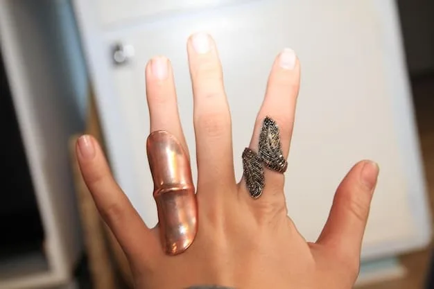 A close-up comparison of gold and silver jewelry being held up to different skin tones, showcasing how each metal complements warm and cool undertones respectively.