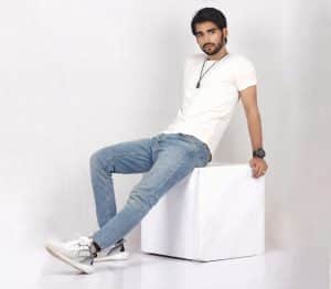 man wearing slim-cut jeans