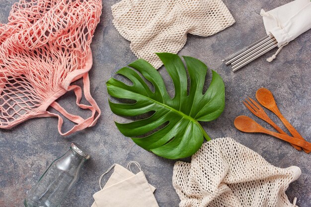 Close-up shot of different types of sustainable fabrics, such as organic cotton, hemp, bamboo, and recycled polyester, displayed in a visually appealing arrangement. Each fabric swatch is labeled with its name and key benefits.