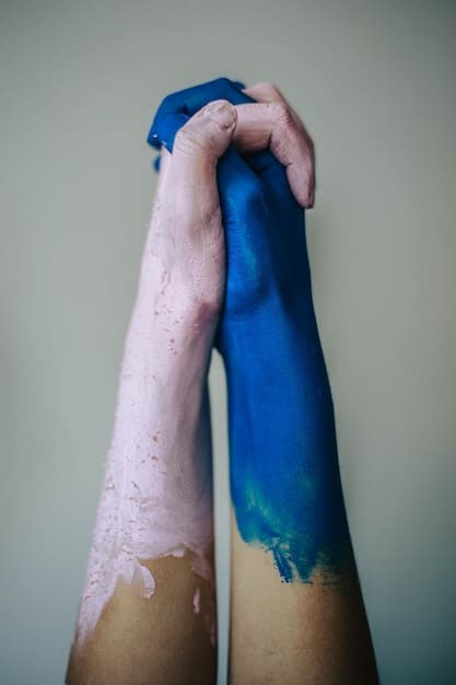 A close-up comparison of two arms, one showing blue veins indicating a cool undertone, and the other showing green veins indicating a warm undertone. The image is well-lit and focused on the veins for clear differentiation.