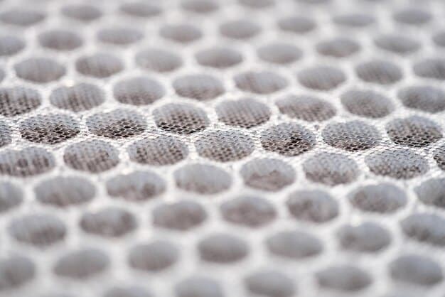 A close-up shot of cellular shades, clearly showing their honeycomb structure and the air pockets that provide insulation.