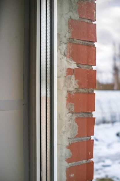 A close-up of a double-pane window showing the layers and construction, emphasizing the insulation differences between single and double-pane windows.