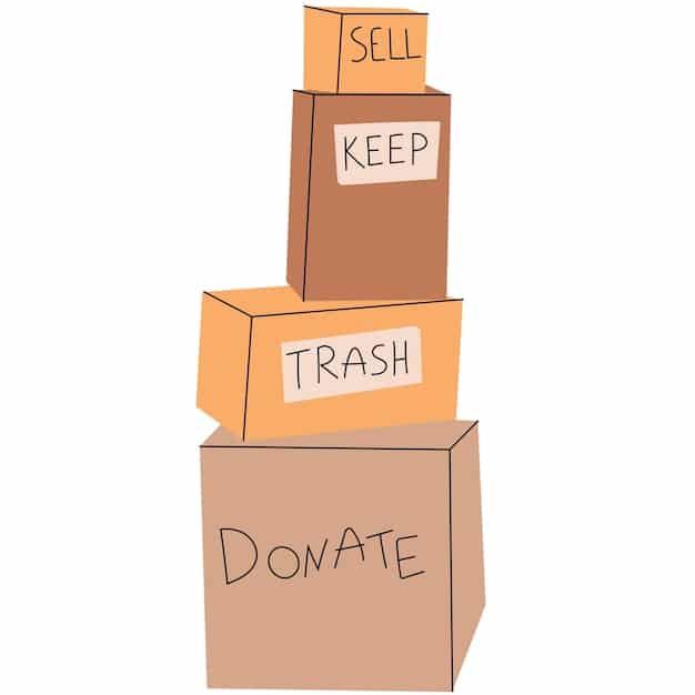 A set of clear, organized boxes labeled for sorting items during decluttering, with categories like 