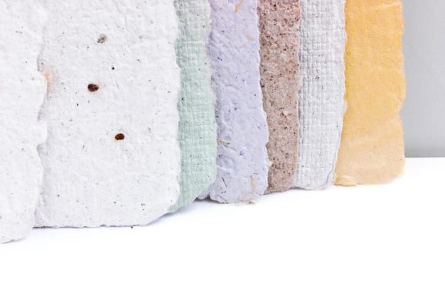 A close-up shot showing different types of insulation materials side-by-side, including fiberglass batting, spray foam, and cellulose. Labels identify each material and highlight their unique textures and compositions.