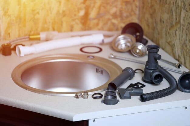 A close-up shot of a homeowner replacing a worn-out washer inside a disassembled faucet, with various plumbing tools scattered around the sink.