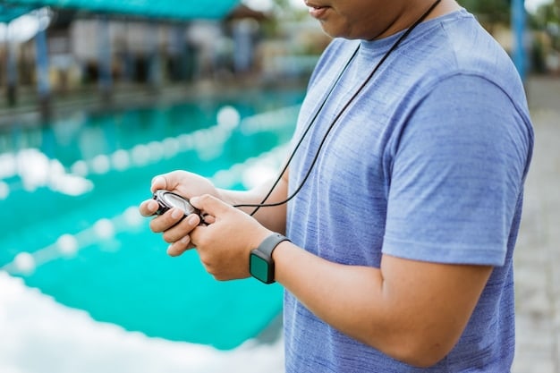A person swimming while wearing a waterproof fitness tracker. The tracker is displaying real-time data about the swim, such as laps, distance, and heart rate.