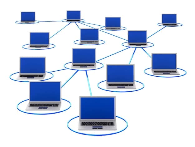 A graphical representation of a distributed ledger, showing multiple computers connected in a network. Each computer displays the same blockchain data, highlighting the concept of decentralization. Arrows indicate the flow of information and validation processes between the nodes.