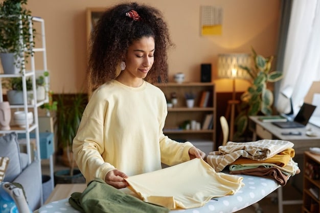 A person holding up a piece of clothing from a SHEIN mystery box and examining the fabric and stitching closely. The focus is on the details that indicate the quality of the item.
